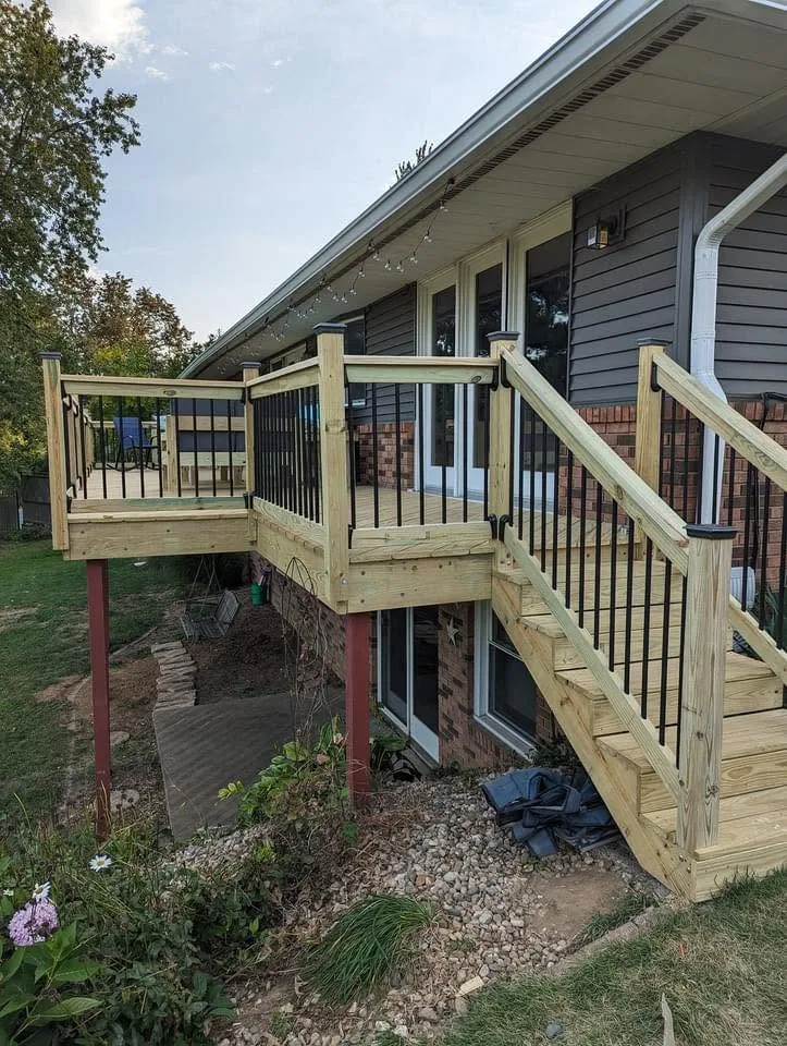 Deck construction on a sloped backyard in Peoria, Illinois