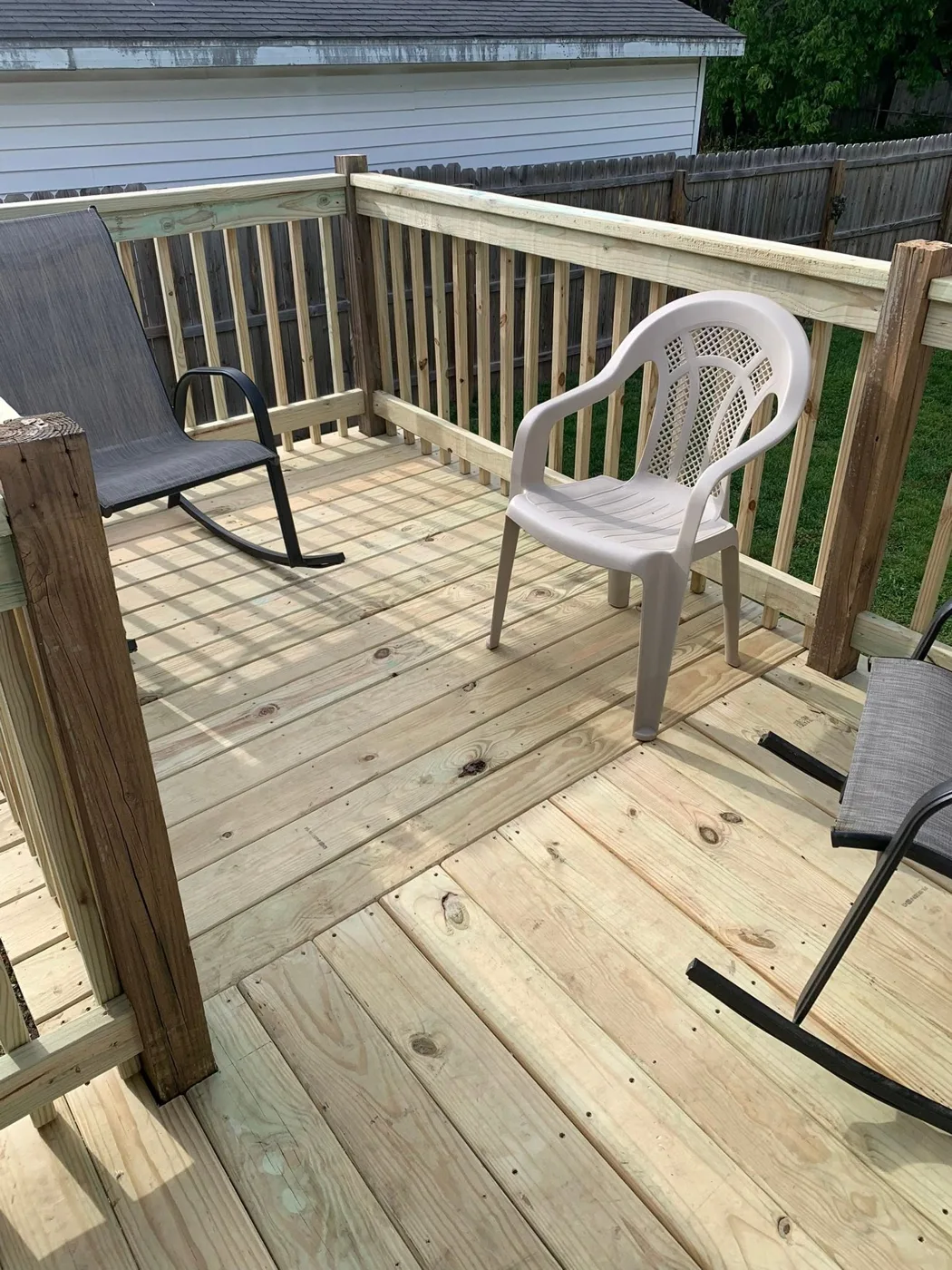 New deck boards installed on an existing deck frame in Pekin, Illinois