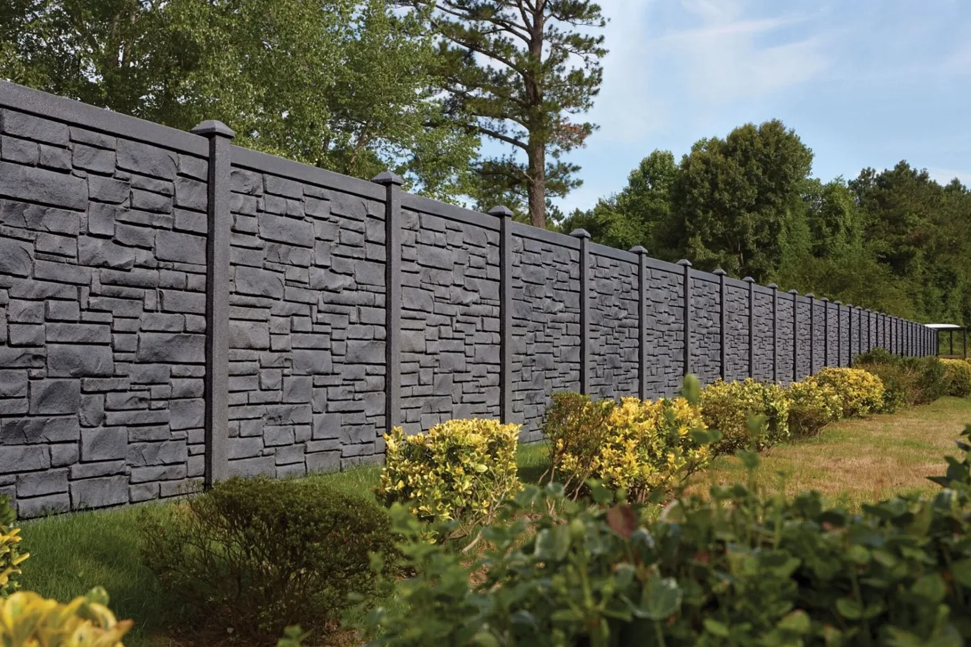 Simulated stone composite fence panel