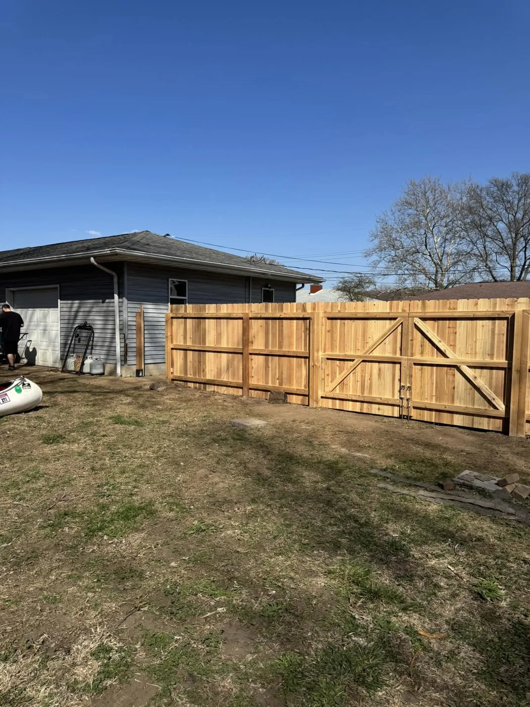 Solid wood privacy fence in a Central Illinois backyard